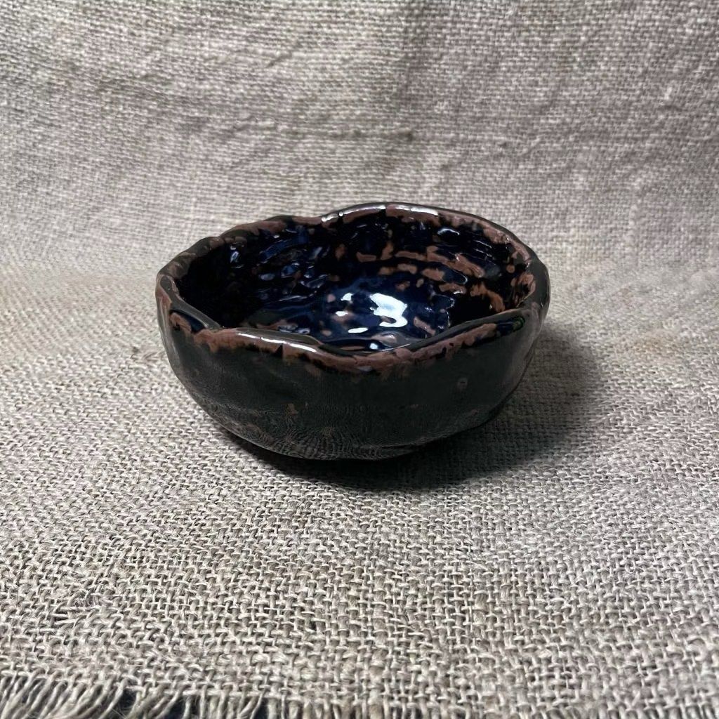 Wabi sabi Bowl (Marked) (Category: Other Kitchenware & Tableware) located in Bulacan. Submitted by ceramicscubby (Listing ID 1432337738, Image 3). Description: Size: 4.8 x 5 D; 2.25 H in. ❗️CLOSING DOWN SALE, ALL PRICES ARE MARKED DOWN. WE WILL NOT BE ACCEPTING OFFERS LOWER THAN OUR ASKING PRICE. ❗️ - Handmade ceramic bowl - Dark blue interior - Textured, brown-edged rim - Speckled, glossy exterior finish - Irregular shape - Ideal for small items