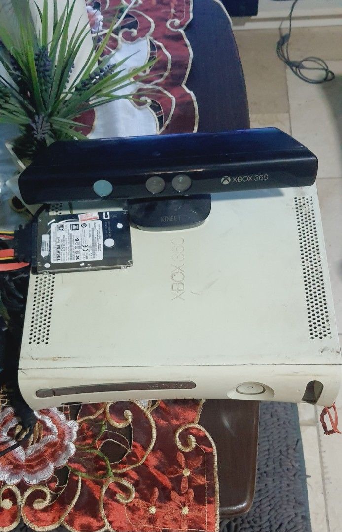 Xbox 360 with Kinect and HDD (Category: Xbox) located in Marikina City. Submitted by warmocean_cd5726 (Listing ID 1432236584, Image 1). Description: - White Xbox 360 console - Includes Kinect sensor - External hard drive included - Fully functional - Power cable included - Perfect for gaming and entertainment.