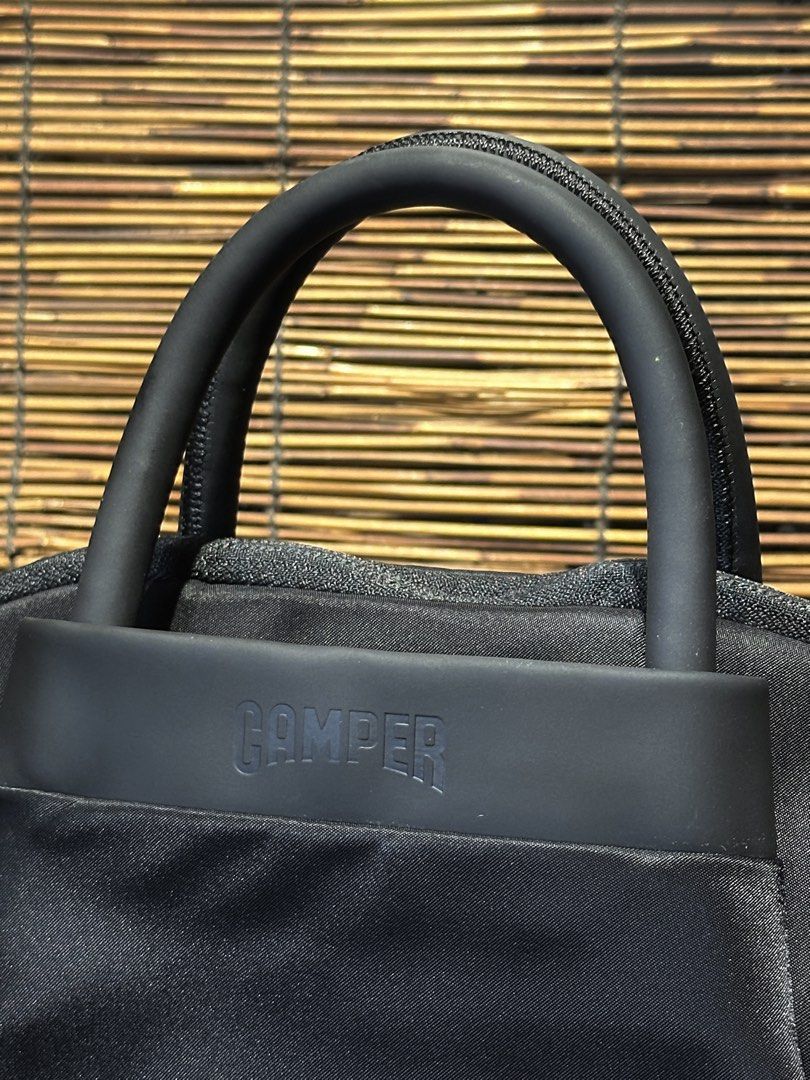🇯🇵 CAMPER. Nylon Bag. Small Bag (Category: Luxury Bags & Wallets) located in Quezon City. Submitted by whatsinmyclosett (Listing ID 1432582475, Image 3). Description: 🇯🇵 CAMPER. Nylon Bag ☑️ITEM IN JAPAN ☑️VINTAGE ☑️100% ORIGINAL ☑️good condition ☑️ 17.5 X 27 X 20 CM ☑️manage your EXPECTATIONS this is second hand / vintage bag HINDI po BRANDNEW Binibili mo 🔴 normal sign of ussage maganda ang item! Missing strap. Kasya promax. Expensive ang b