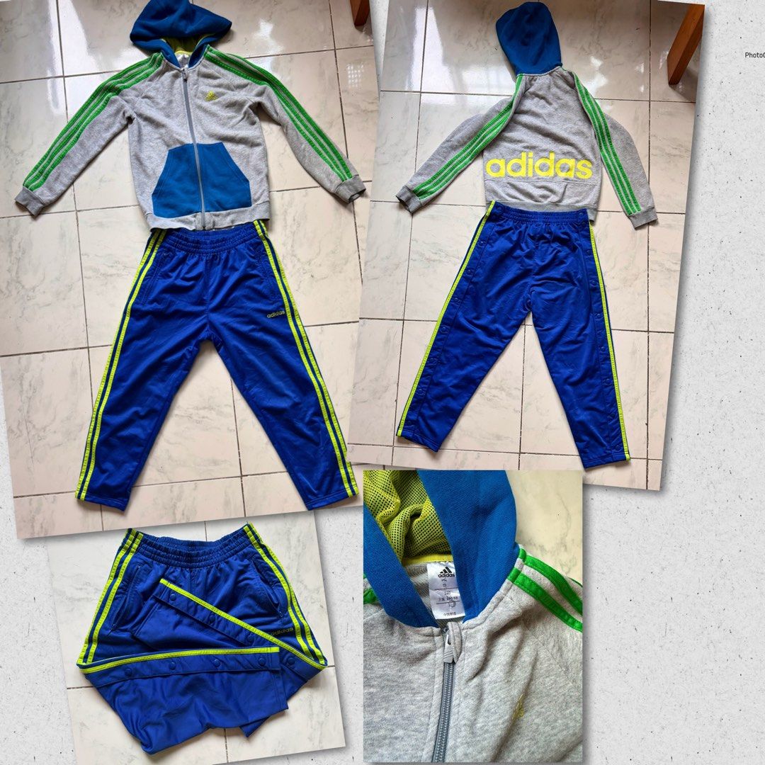 Adidas Tracksuit Set - Grey and Blue (Category: Sets & Coordinates) located in Paranaque City. Submitted by crew08 (Listing ID 1432545524, Image 1). Description: - Adidas tracksuit set (SOLD AS SET) -Size 140 - Grey zip-up hoodie - Green stripes on sleeves - Blue hood - Matching blue track pants - Green stripes on sides - Snap closures - Adidas logo on jacket and pants Good condition,zipper and buttons smoothly working -Name stamp of my son at th