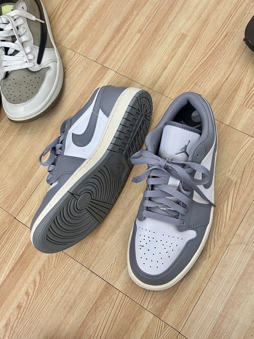 Air Jordan 1 Low Grey White (Category: Sneakers) located in Cebu City. Submitted by maria.makiling (Listing ID 1432445022, Image 1). Description: Air Jordan 1 Low 2 pairs - size 8 mens and size 7 womens Original Personally owned US Size 8 -No box/lace, pair only hence the low price No low-balling pls. condition 8/10.