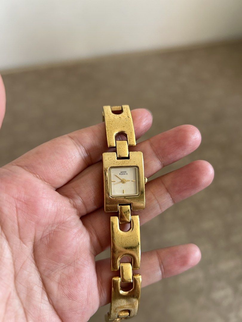 Anne Klein Gold Watch (Category: Women's Watches) located in General Trias. Submitted by pepperreena (Listing ID 1432438107, Image 2). Description: - Anne Klein watch - Gold-toned bracelet - Rectangular face - Stainless steel back -Need to change battery as its not working.
