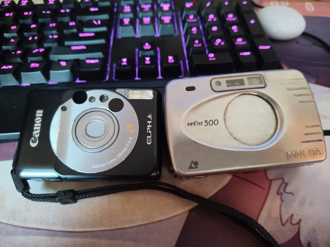 APS Film Cameras (Category: Cameras) located in Las Pinas. Submitted by rogelio_sama (Listing ID 1432446302, Image 1). Description: Selling 2 APS film cameras from my personal collection. Camera 1 Canon Elph jr. +Needs 1pc CR2 battery +Crisp and clean Buttons +Clean film compartment +With original leather case Camera 2 Minolta Vectis 300 +Needs 1pc CR2 battery +Clean film compartment +Unit only Selling each for 600 php Willing to bundle both for 