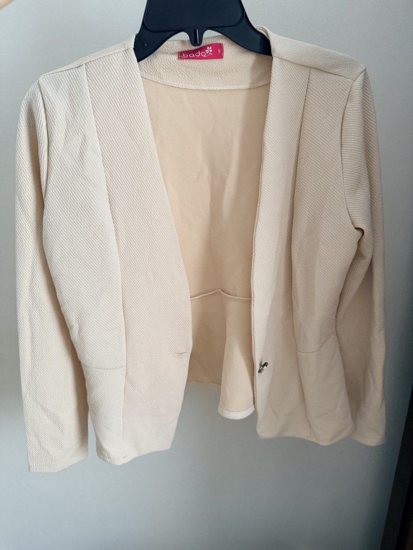 Bado Blazer (Category: Coats, Jackets and Outerwear) located in Cebu City. Submitted by dr_marsh (Listing ID 1432437476, Image 1). Description: Bado cream blazer, small size. Features a peplum hem, long sleeves, and single-button closure. Textured weave. Elegant and versatile..