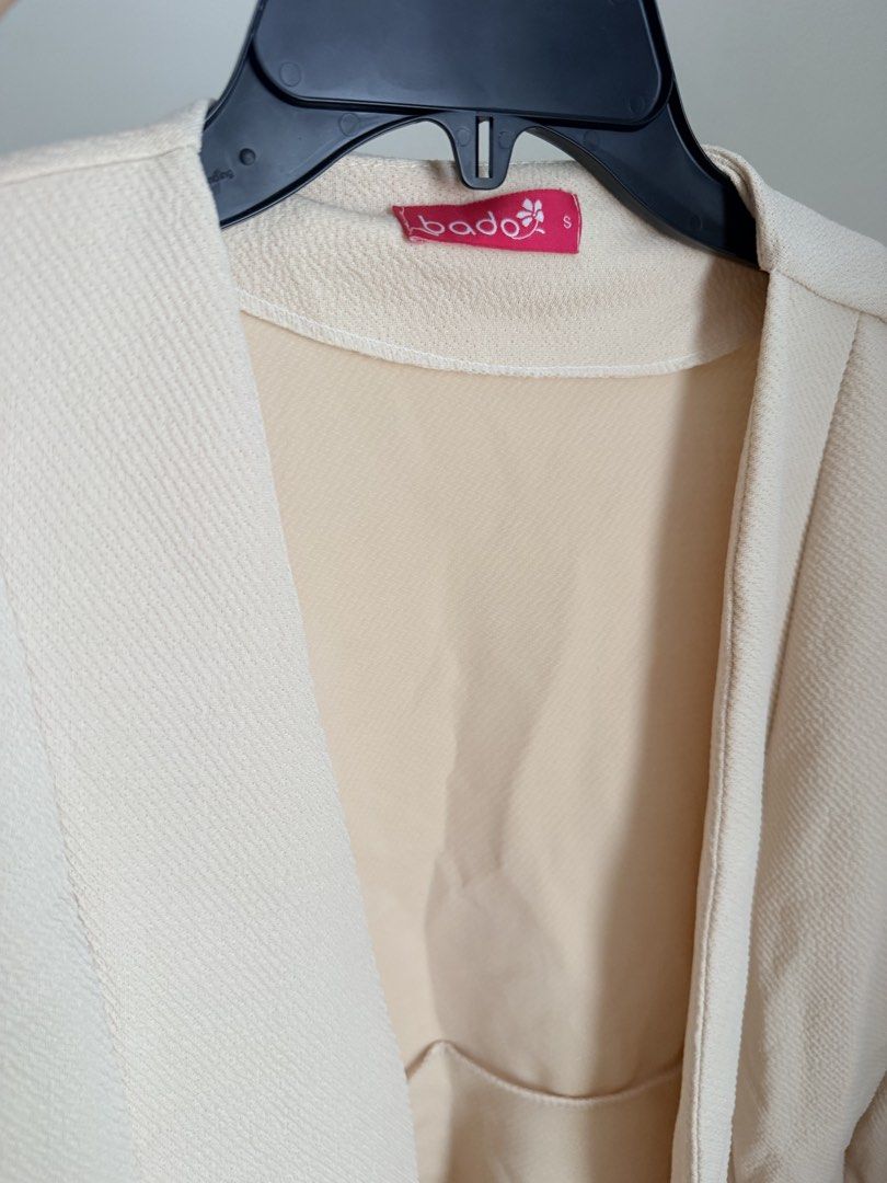 Bado Blazer (Category: Coats, Jackets and Outerwear) located in Cebu City. Submitted by dr_marsh (Listing ID 1432437476, Image 3). Description: Bado cream blazer, small size. Features a peplum hem, long sleeves, and single-button closure. Textured weave. Elegant and versatile..