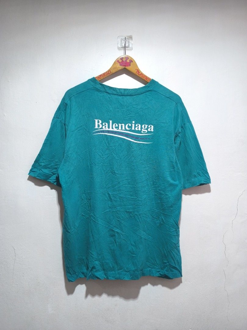 Balenciaga Teal T-shirt (Category: Luxury Apparel) located in Calbayog City. Submitted by phantomthiftstore (Listing ID 1432548520, Image 2). Description: - Authentic Balenciaga t-shirt - Color: Teal - Size: XS - Features Balenciaga logo (front and back) - Made in Portugal - Style: Crew neck, short sleeves.
