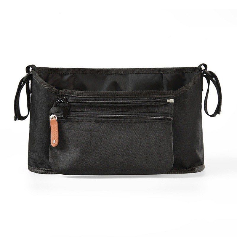 Black Stroller Organizer (Category: Strollers) located in Rodriguez. Submitted by medsnts (Listing ID 1432570102, Image 1). Description: - Black stroller organizer - Multiple compartments for storage - Easy attachment to stroller - Sleek and practical design.