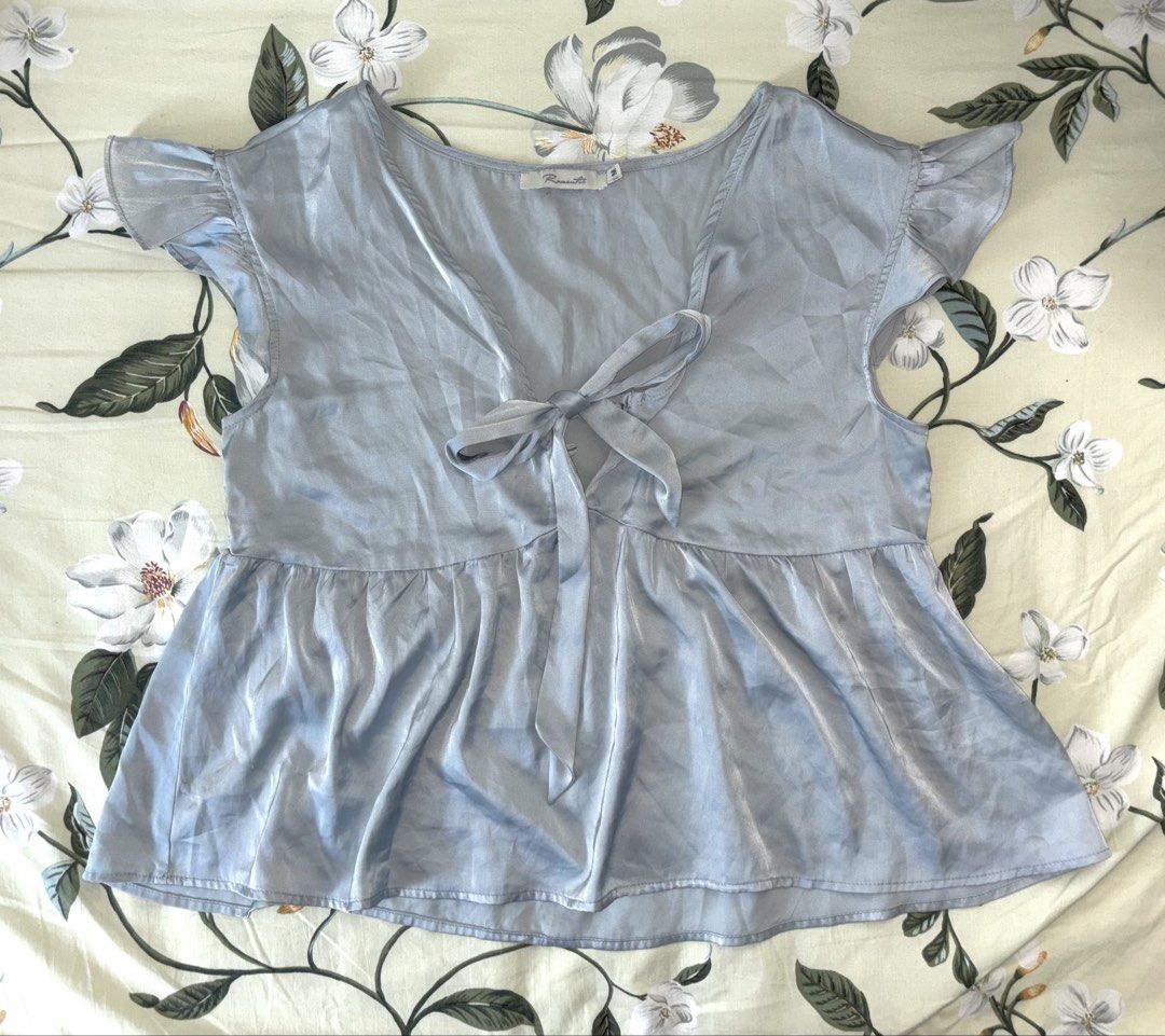 Blue Satin Peplum blouse (Category: Blouses) located in Cavite. Submitted by bbbb444 (Listing ID 1432450261, Image 1). Description: !! NO WW PHOTOS !! - fits M - L - wore once - very loose and is missing a button sa chest part, vv cute nonetheless - thrifted so pls manage ur expectations .