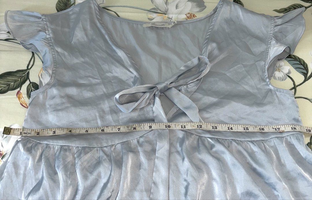 Blue Satin Peplum blouse (Category: Blouses) located in Cavite. Submitted by bbbb444 (Listing ID 1432450261, Image 2). Description: !! NO WW PHOTOS !! - fits M - L - wore once - very loose and is missing a button sa chest part, vv cute nonetheless - thrifted so pls manage ur expectations .