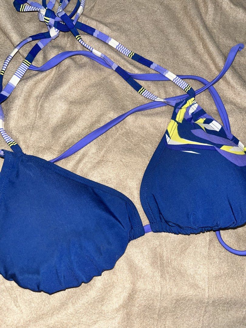 Blue Triangle Bikini Top (Category: Bikinis & Swimsuits) located in Manila. Submitted by quarishop21 (Listing ID 1432510190, Image 2). Description: Used once only ‼️ - Blue triangle bikini top - Adjustable straps with patterned design - Halter style - Reversible: solid blue and patterned sides.