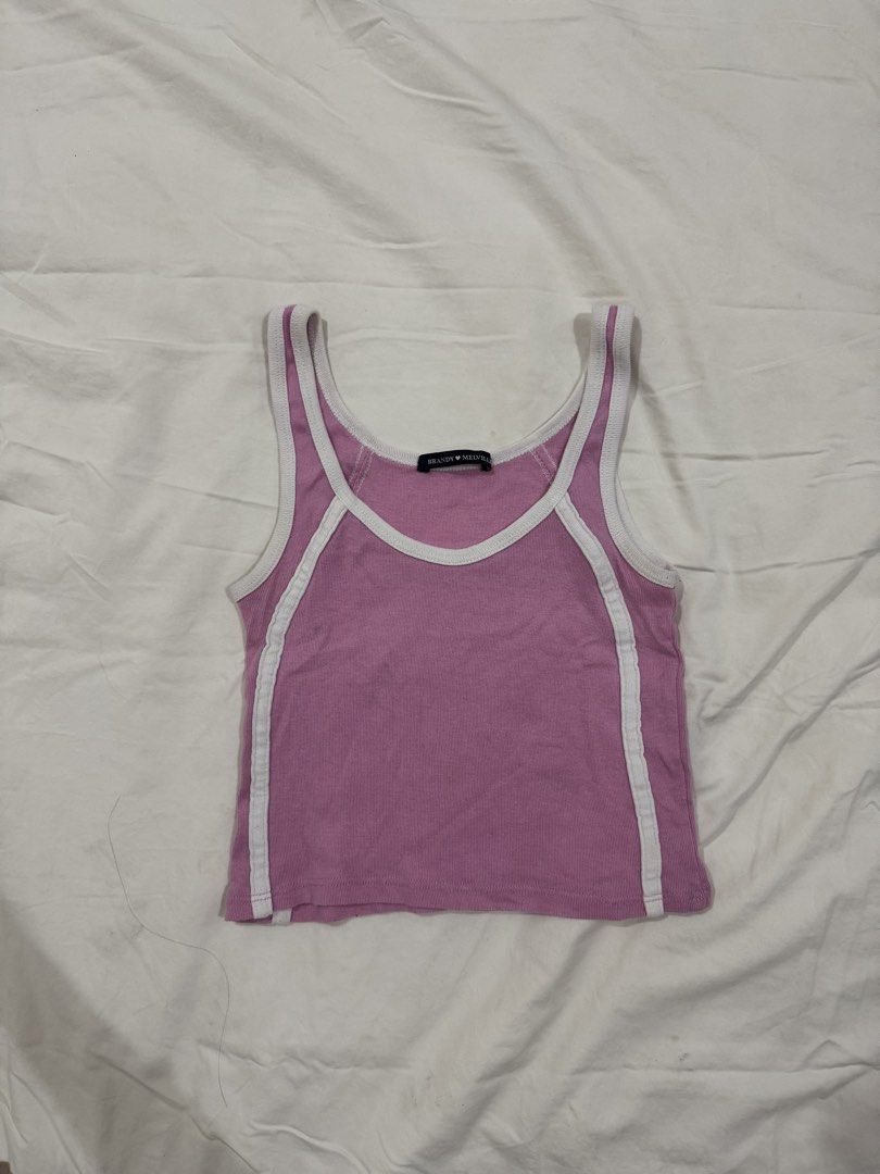 brandy melville pink tank (Category: Sleeveless) located in Muntinlupa City. Submitted by user3837 (Listing ID 1432556844, Image 1). Description: brandy melville 100% cotton pink sporty tank top also bought on carousell!.