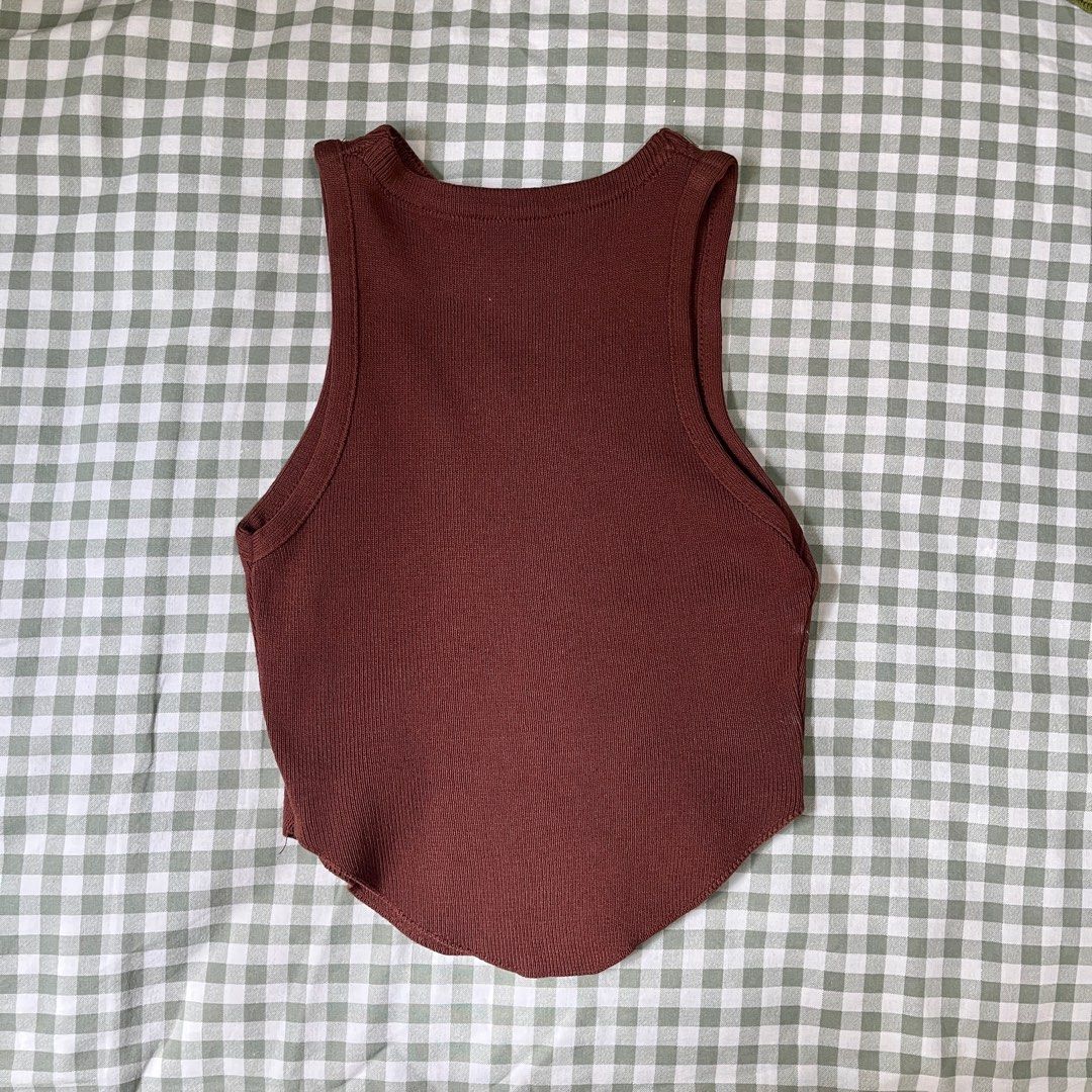 Brown Ribbed Tank Top (Category: Sleeveless) located in Taytay. Submitted by pompompurinrin (Listing ID 1432596958, Image 2). Description: – never worn – rfs: don't like the color payment via gcash or maribank, shipping fee should be shouldered by buyer.