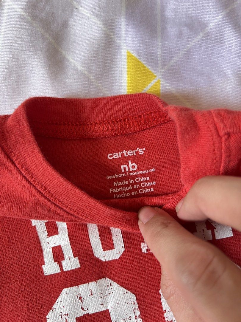 Carter's & Cat & Jack Newborn Outfit (Category: Babies & Kids Fashion) located in Meycauayan. Submitted by maricardima (Listing ID 1432448405, Image 2). Description: - Newborn outfit set - Includes: - Red Carter's t-shirt with "HUNK 36" print and white-striped sleeves - Striped Cat & Jack pants with drawstring and black cuffs - Both items are newborn size 📍Meycauayan, Bulacan 💵 MOP: GCash, BPI ❗️Payment first + SF 🚚 J&T.