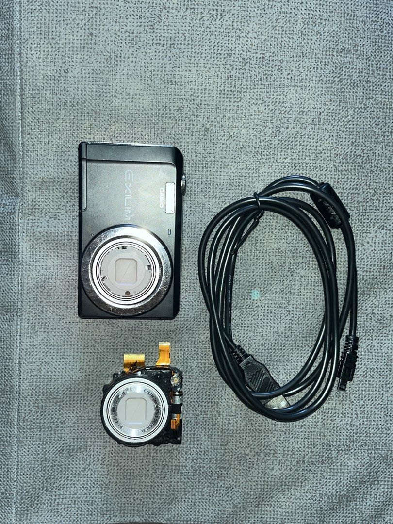 Casio Exilim Digital Camera with Cable (Category: Cameras) located in Manila. Submitted by newbird.936659 (Listing ID 1432483463, Image 1). Description: - Casio Exilim digital camera - Includes camera body and lens - Comes with a charging cable - Model name is visible Cons: Cam lens error, Haven’t repaired it but it will have the other lens with. .