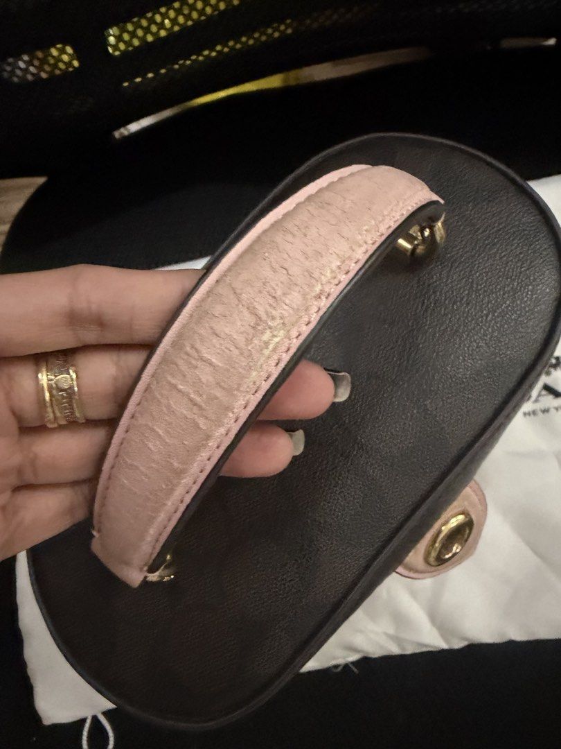 Coach Vanity Sling Bag (Category: Luxury Bags & Wallets) located in Rizal. Submitted by caintarizal2024 (Listing ID 1432459607, Image 3). Description: 👜 FOR SALE: Original Coach Bag 👜 Selling my original Coach vanity/top handle bag for only ₱2,300 ✨ ✔️ Comes with detachable long strap ✔️ With original Coach dust bag ✔️ Nice and classy design ✔️ Spacious enough for your essentials Condition: Pre-loved. Please note may issue sa pink leather handl