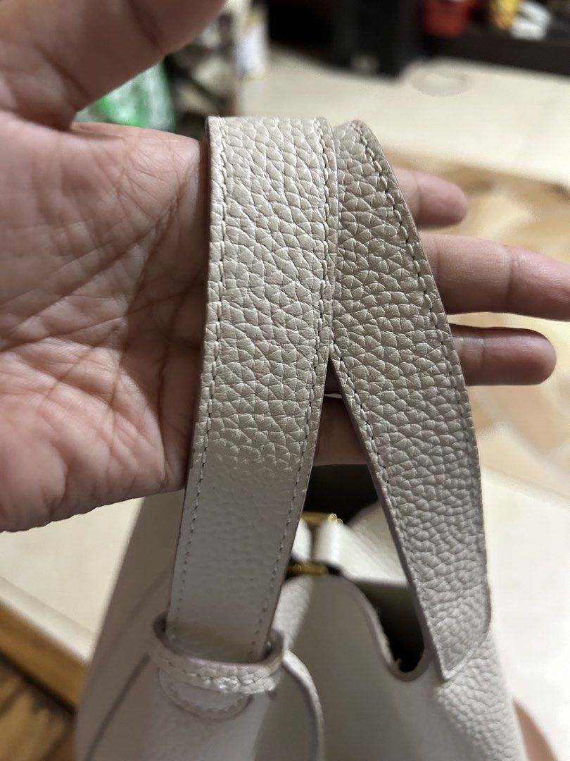 Cream-colored Picotin style (Category: Luxury Bags & Wallets) located in Cebu City. Submitted by yenetcuba52435 (Listing ID 1432540189, Image 2). Description: - Cream-colored Picotin style bag - Bucket bag design - Made of leather - Pristine condition - Stylish and functional.