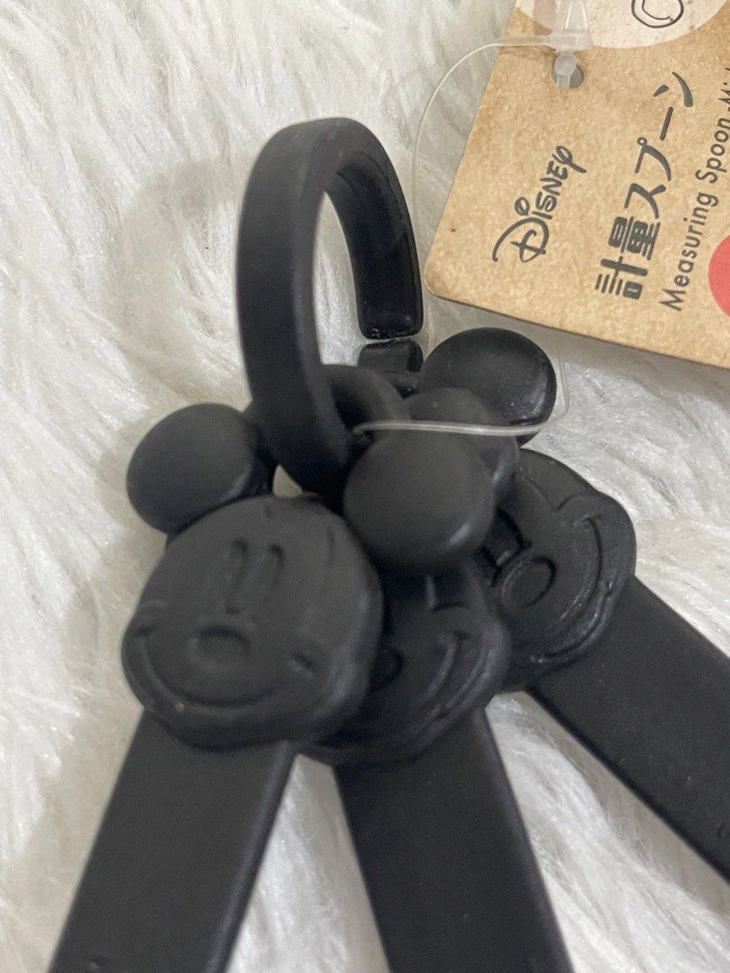 Disney Mickey Mouse Measuring Spoons (Category: Bakeware) located in Bayambang. Submitted by foursiblings081228 (Listing ID 1432425309, Image 2). Description: Set of three black measuring spoons featuring Mickey Mouse design. Includes 5ml, 15ml, and 19ml spoons. Comes with a ring to keep the spoons together. The original tag is still attached..
