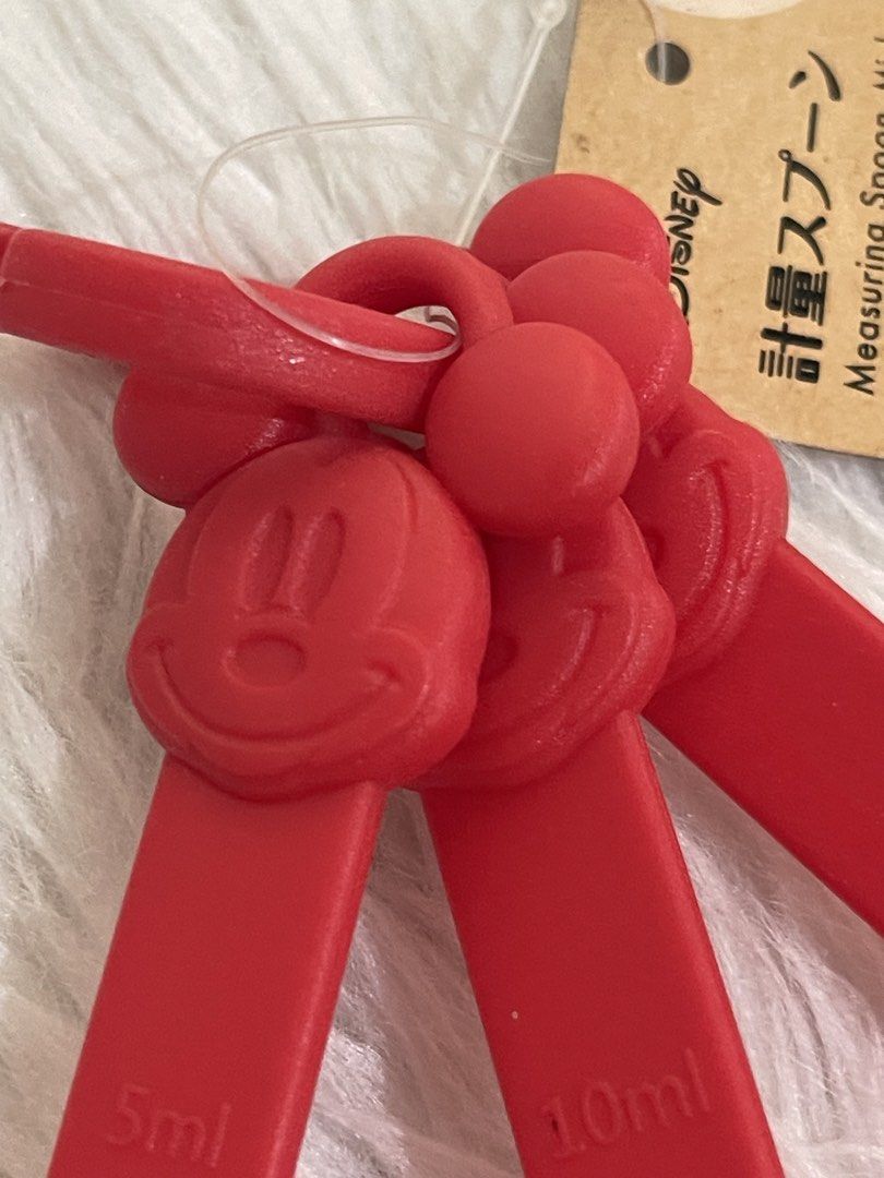 Disney Mickey Mouse Measuring Spoons (Category: Bakeware) located in Bayambang. Submitted by foursiblings081228 (Listing ID 1432425428, Image 3). Description: - Set of red Disney Mickey Mouse measuring spoons - Includes 5ml, 10ml, and 15ml spoons - Features Mickey Mouse design - Comes with original tag - Perfect for baking and cooking.