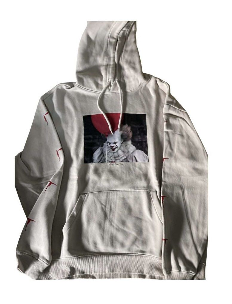 Divided Pennywise Hoodie (Category: Hoodies) located in Makati City. Submitted by things77 (Listing ID 1432505134, Image 1). Description: - Pennywise graphic hoodie - Features "You'll float too" phrase - Kangaroo pocket - Hood with drawstrings - Red "IT" symbols on sleeves - Size: M/S - Color: Light beige.