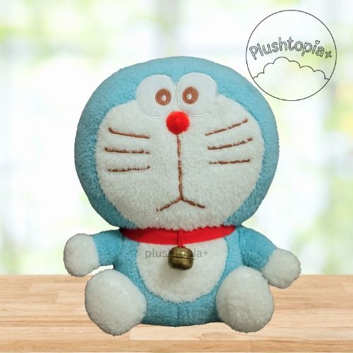 Doraemon with Bell (Category: Plushies & Soft Toys) located in Mandaluyong City. Submitted by plushtopiaplus (Listing ID 1432476852, Image 1). Description: Doraemon with Bell 13 inches 💯Official Embroidered eyes 📍Mandaluyong City MOD: Grab, Lalamove to be booked by buyer MOP: Gcash/ BPI QR.