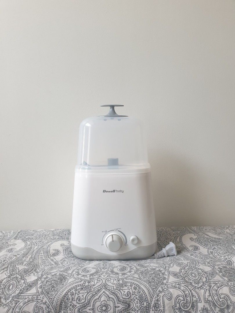 Dowell baby warmer (Category: Breastfeeding & Bottle Feeding) located in Calamba. Submitted by junethomasb (Listing ID 1432425154, Image 1). Description: Russell Hobbs baby bottle sterilizer is designed for efficient sterilization. It includes a lid, a tray, and a bottle holder. The sterilizer has a white body with a control dial. Perfect for keeping baby bottles and accessories clean and safe..