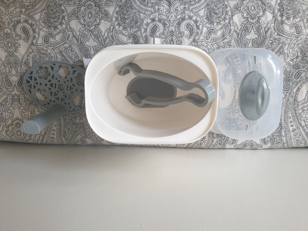 Dowell baby warmer (Category: Breastfeeding & Bottle Feeding) located in Calamba. Submitted by junethomasb (Listing ID 1432425154, Image 3). Description: Russell Hobbs baby bottle sterilizer is designed for efficient sterilization. It includes a lid, a tray, and a bottle holder. The sterilizer has a white body with a control dial. Perfect for keeping baby bottles and accessories clean and safe..