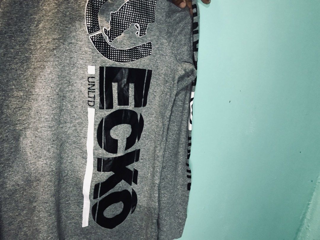 Ecko Unltd. Long Sleeve Shirt 3XL (Category: Tshirts & Polo Shirts ) located in Manila. Submitted by zerimar01 (Listing ID 1432591239, Image 3). Description: - Ecko Unltd. long sleeve shirt - Color: Gray - Size: 3XL -25x30 - Features Ecko logo on front and sleeve - Features Rhino Brand logo on sleeve - Ribbed texture - Made in Pakistan.