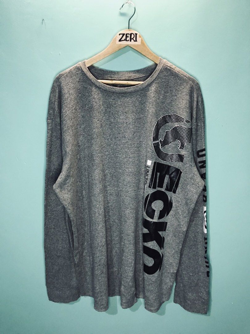 Ecko Unltd. Long Sleeve Shirt 3XL (Category: Tshirts & Polo Shirts ) located in Manila. Submitted by zerimar01 (Listing ID 1432591239, Image 1). Description: - Ecko Unltd. long sleeve shirt - Color: Gray - Size: 3XL -25x30 - Features Ecko logo on front and sleeve - Features Rhino Brand logo on sleeve - Ribbed texture - Made in Pakistan.