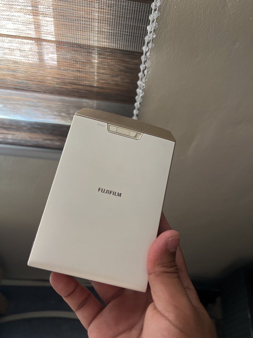 Fujifilm Instax Share SP-2 Printer (Category: Printers, Scanners & Copiers) located in Subic. Submitted by kirkneezy (Listing ID 1432458681, Image 3). Description: 📸 INSTAX SHARE SP-2 PRINTER (WORKING) – STEAL PRICE! Turn your phone photos into instant prints in seconds 🔥 Perfect for memories, scrapbooks, or gifts. ✅ Tested & working ✅ Compact and easy to use ✅ Connect via app (wireless printing) ⚠️ Please read: – No original charger (lost) – N