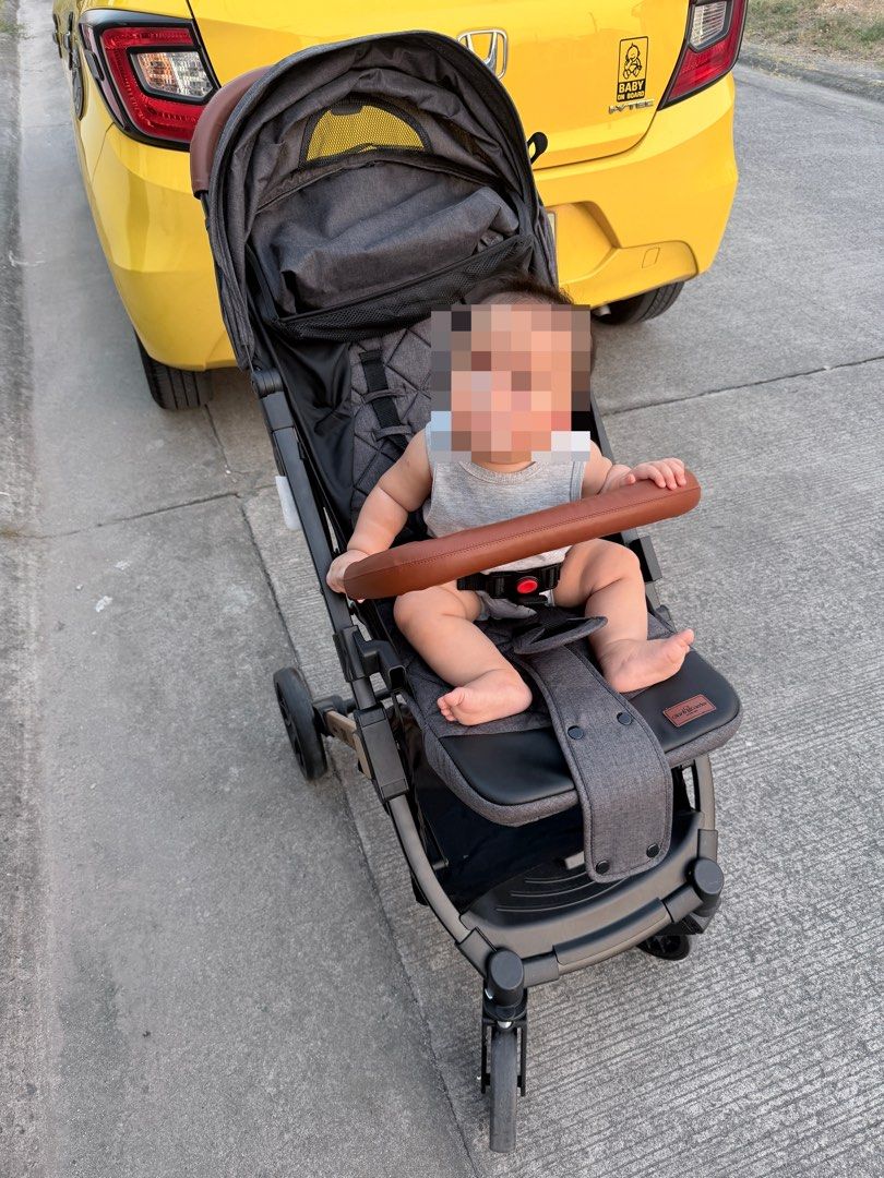 Giant Carrier Xenvo Stroller (Category: Strollers) located in San Fernando. Submitted by iamnumbersixteen (Listing ID 1432523206, Image 2). Description: - Sleek design with brown handle - Dark grey seat - Canopy for sun protection - Safety harness included - Sturdy frame and wheels - Black and beige frame - Brown handlebar - Storage basket underneath - Suitable for babies - Padded seat for comfort - Black wheels Hindi napo nagagamit. Used it for 
