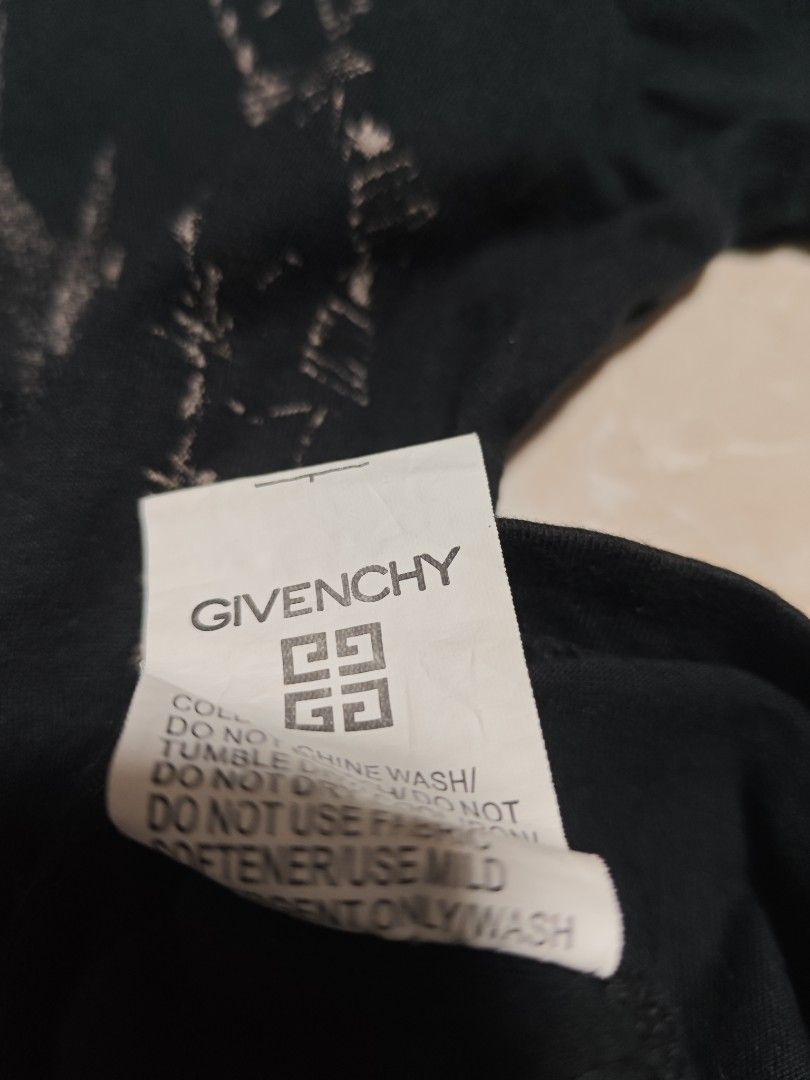Givenchy Jesus Print T-shirt (Category: Tshirts & Polo Shirts ) located in Cabuyao City. Submitted by grand_vault (Listing ID 1432579148, Image 3). Description: - Givenchy T-shirt - Black color - Features a Jesus print - Size: M - Crew neck - Short sleeves - Authentic with Givenchy logo tag - Unique design - 22x28.