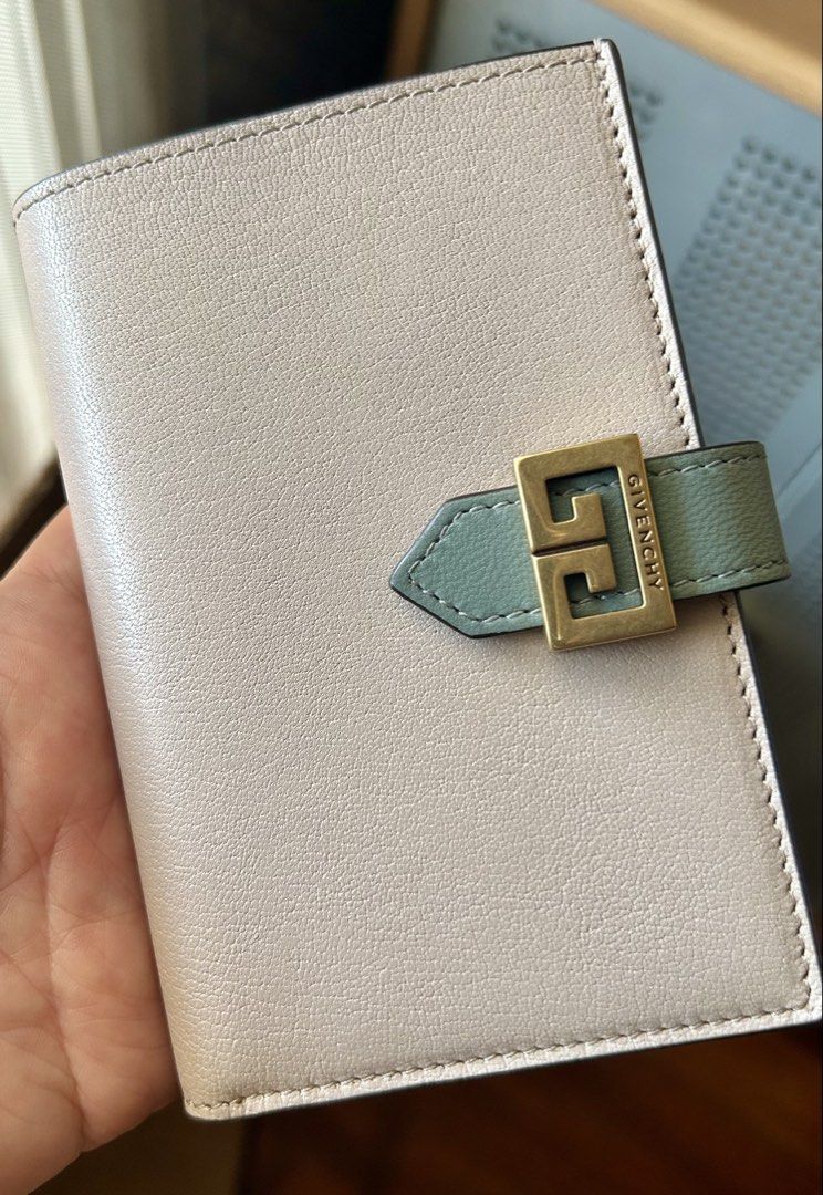 Givenchy Leather Wallet (Category: Luxury Bags & Wallets) located in Quezon City. Submitted by asiaco (Listing ID 1432440229, Image 1). Description: Authentic Givenchy bi-fold wallet. Beige and green colorway with gold logo buckle. Very clean, hardly used. Made in Italy..