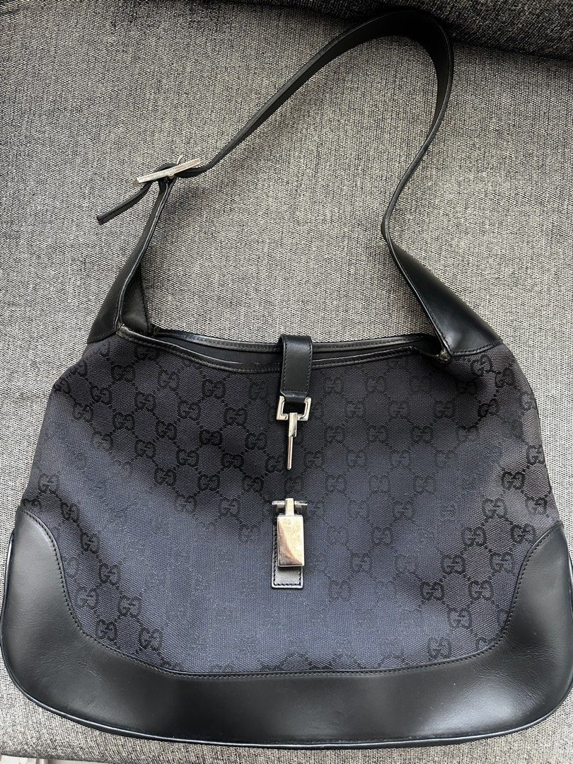 Gucci Jackie Shoulder Bag (Category: Luxury Bags & Wallets) located in Calasiao. Submitted by cielo_b25 (Listing ID 1432478646, Image 3). Description: 🖤 Gucci Jackie Shoulder Bag – Black GG Canvas (₱15,000) Classic and timeless Gucci Jackie bag in black GG monogram canvas with leather trim. Effortlessly chic and perfect for everyday use. ✨ Details: * Black GG canvas with leather trim * Iconic piston lock closure * Adjustable shoulder strap * Lig