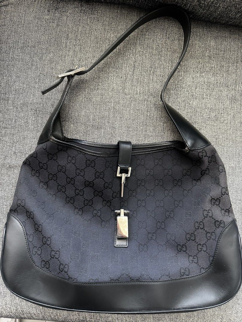 Gucci Jackie Shoulder Bag (Category: Luxury Bags & Wallets) located in Calasiao. Submitted by cielo_b25 (Listing ID 1432478646, Image 2). Description: 🖤 Gucci Jackie Shoulder Bag – Black GG Canvas (₱15,000) Classic and timeless Gucci Jackie bag in black GG monogram canvas with leather trim. Effortlessly chic and perfect for everyday use. ✨ Details: * Black GG canvas with leather trim * Iconic piston lock closure * Adjustable shoulder strap * Lig
