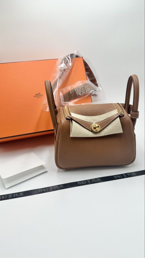 Hermes Mini Lindy II Gold (Category: Luxury Bags & Wallets) located in Pasig City. Submitted by bagplaymnl (Listing ID 1432588942, Image 1). Description: Hermes Mini Lindy II Gold GHW ~ Stamp K. Store fresh. Brand New 2026 Full Set with store receipt MOP: BDO/Cash Meet up: BGC Thank you!.