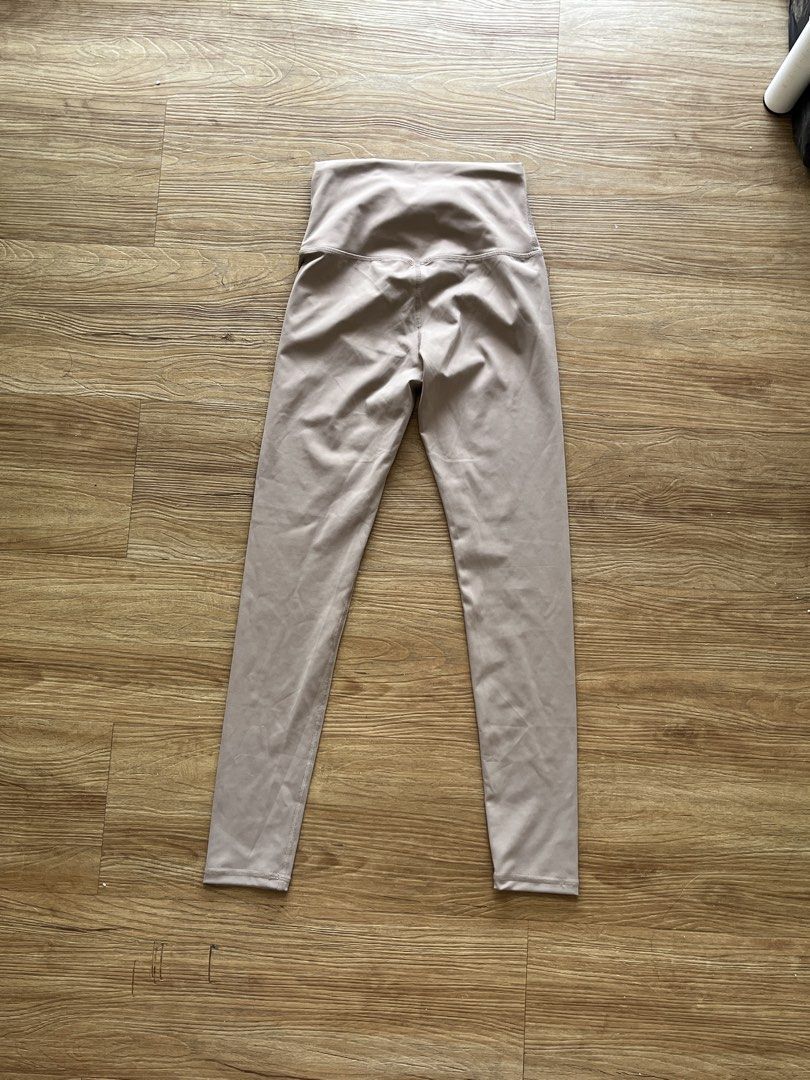 High-Waisted Leggings - Taupe (Category: Other Bottoms) located in Pasay City. Submitted by beansshop (Listing ID 1432442947, Image 3). Description: - High-waisted leggings - Neutral taupe color - Smooth and sleek appearance - Fitted design - Made of stretchy material - Suitable for various activities - Simple, clean design - Wide waistband for a comfortable fit.
