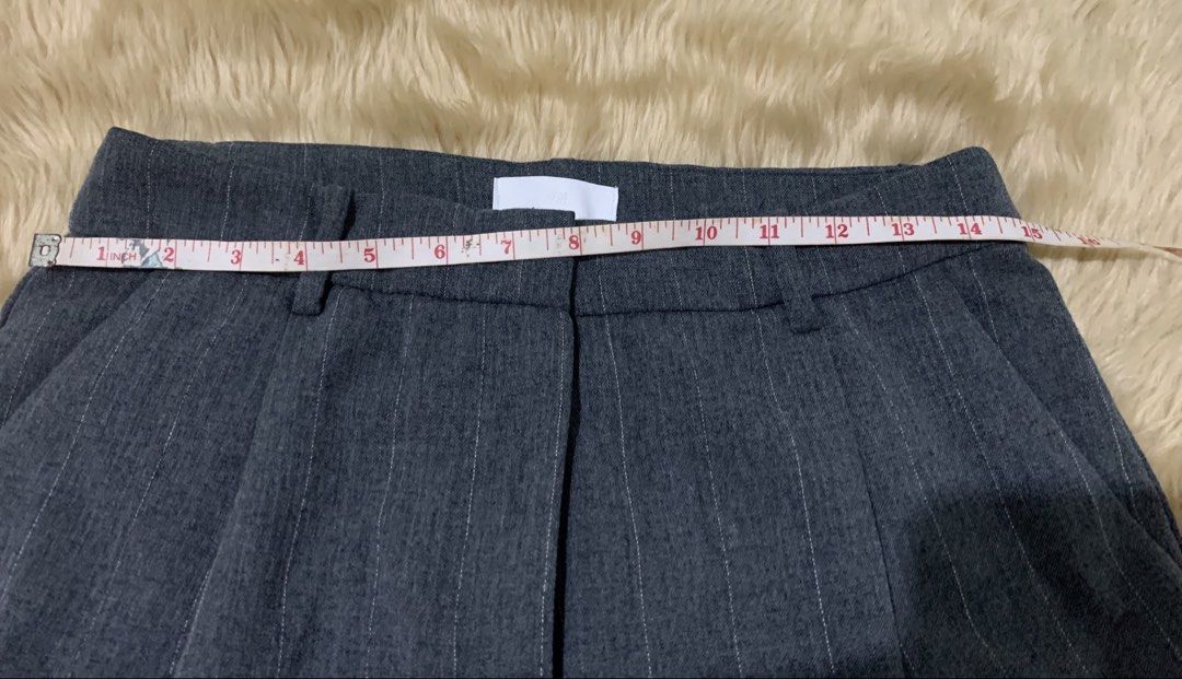 H&M Gray Pinstripe Wide Leg Pants (Category: Other Bottoms) located in Paranaque City. Submitted by vbvessentials (Listing ID 1432504639, Image 3). Description: H&M Wide Leg Pants waist: approximately 30 inches Length: approximately 38 inches Great for work or casual wear. .