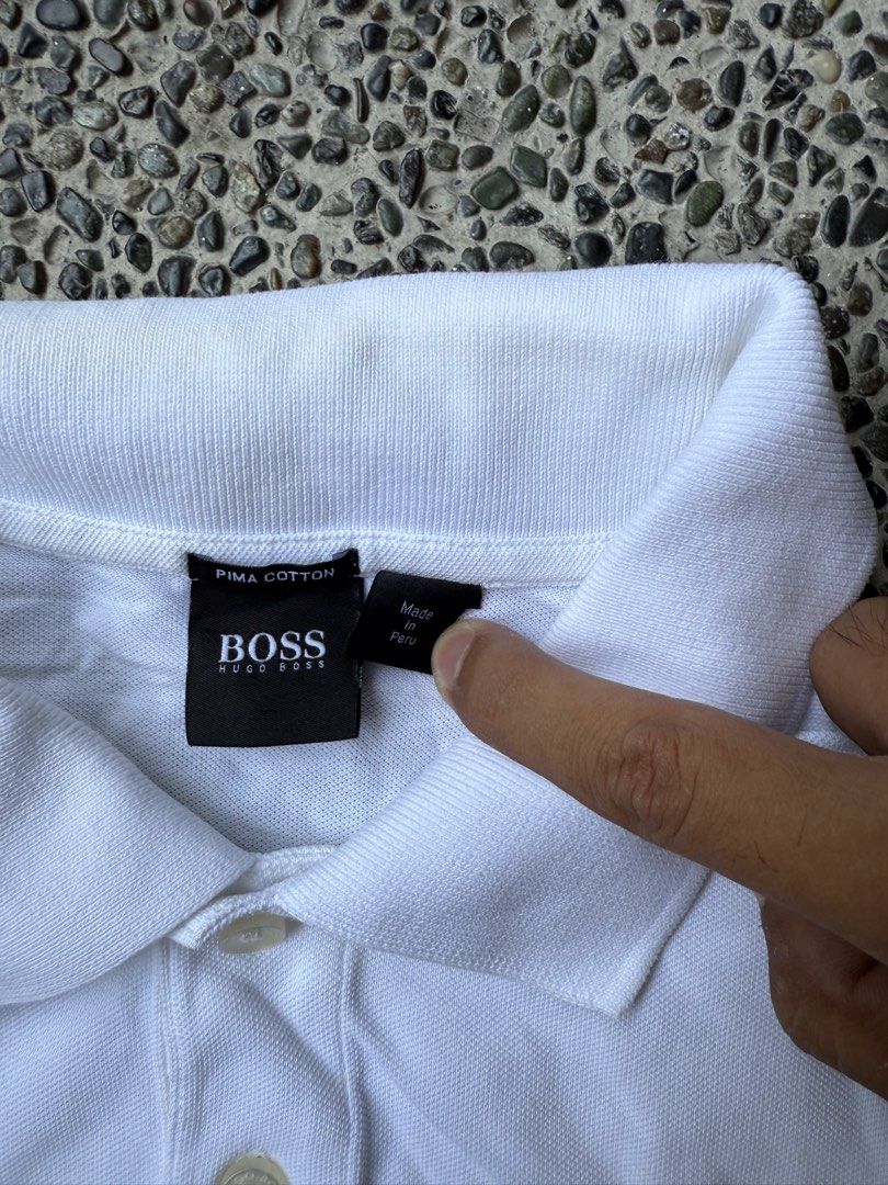 Hugo Boss Polo Shirt (Category: Tshirts & Polo Shirts ) located in Dinalupihan. Submitted by thrift.trips (Listing ID 1432566201, Image 3). Description: - Navy blue hugo boss - Length 27 - Width 19 - White hugo boss - Length 27 - Width 22.
