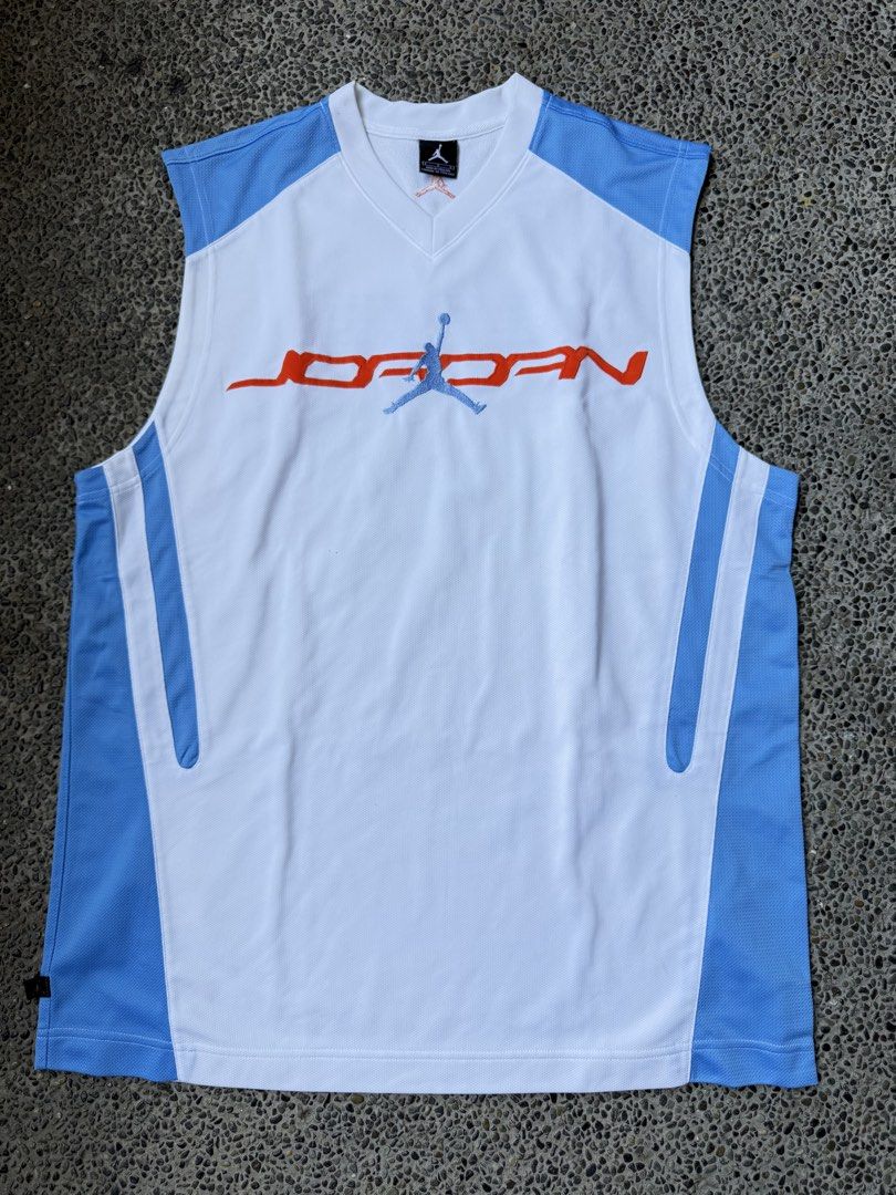 Jordan Basketball Jersey White Blue (Category: Activewear) located in Dinalupihan. Submitted by thrift.trips (Listing ID 1432562699, Image 1). Description: - Authentic Jordan basketball jersey - Color: White and Blue - Features Jumpman logo and "JORDAN" across the front - Displays "23" on the back - Size: L - Made in Thailand - Material: 100% polyester - Perfect for basketball fans and casual wear - Length 32 - Width 23.