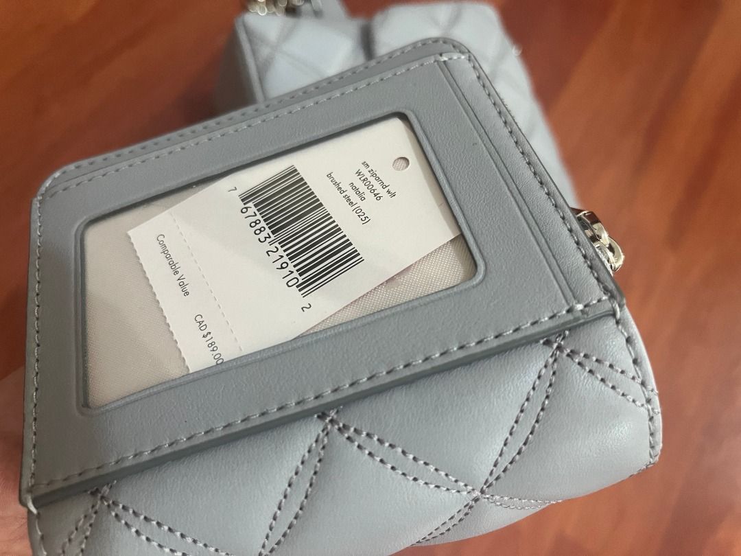 Kate Spade Quilted Shoulder Bag and Wallet Set (Category: Luxury Bags & Wallets) located in San Fernando. Submitted by kayr_ (Listing ID 1432432186, Image 2). Description: Brand new with tags Greyish Blue color Kate Spade Natalia small flap bag Quilted pattern design Comes with wallet - Quilted shoulder bag with chain strap - Turn-lock closure - Matching wallet with cardholder window - Wallet with zip closure - Both items in light grey color - Ba