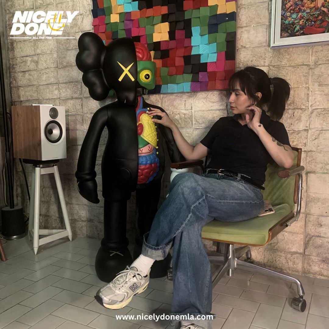 KAWS (Category: Figurines & Statues) located in Manila. Submitted by nicelydone31948 (Listing ID 1432400094, Image 3). Description: - KAWS Dissected Companion Figure - Color: Black - Features the iconic "X" eyes - Design: Dissected side revealing internal organs - Dimensions: 131 cm (height) x 62 cm (width) - A highly sought-after collectible.