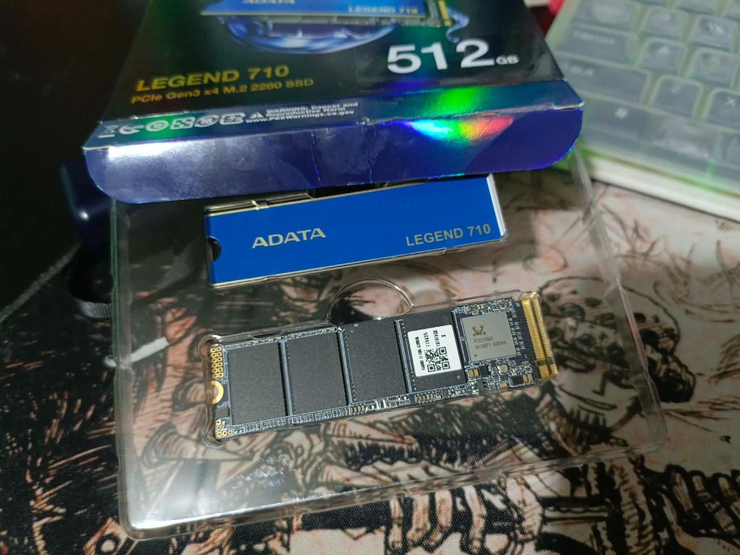 LEGEND 710 PCIe Gen3 x4 M.2 2280 Solid State Drive (Category: Hard Disks & Thumbdrives) located in Manila. Submitted by jhayem.39_rabbit_tree (Listing ID 1432544566, Image 3). Description: Brand NEW - PCIe Gen3 x4 interface ● Excellent read/write performance ● Heat sink keeps things 15% cooler ● Great upgrade option for creators ● High capacities ● Supports NVMe 1.4 ● LDPC & AES 256-bit encryption ● Supports Host Memory Buffer(HMB) .