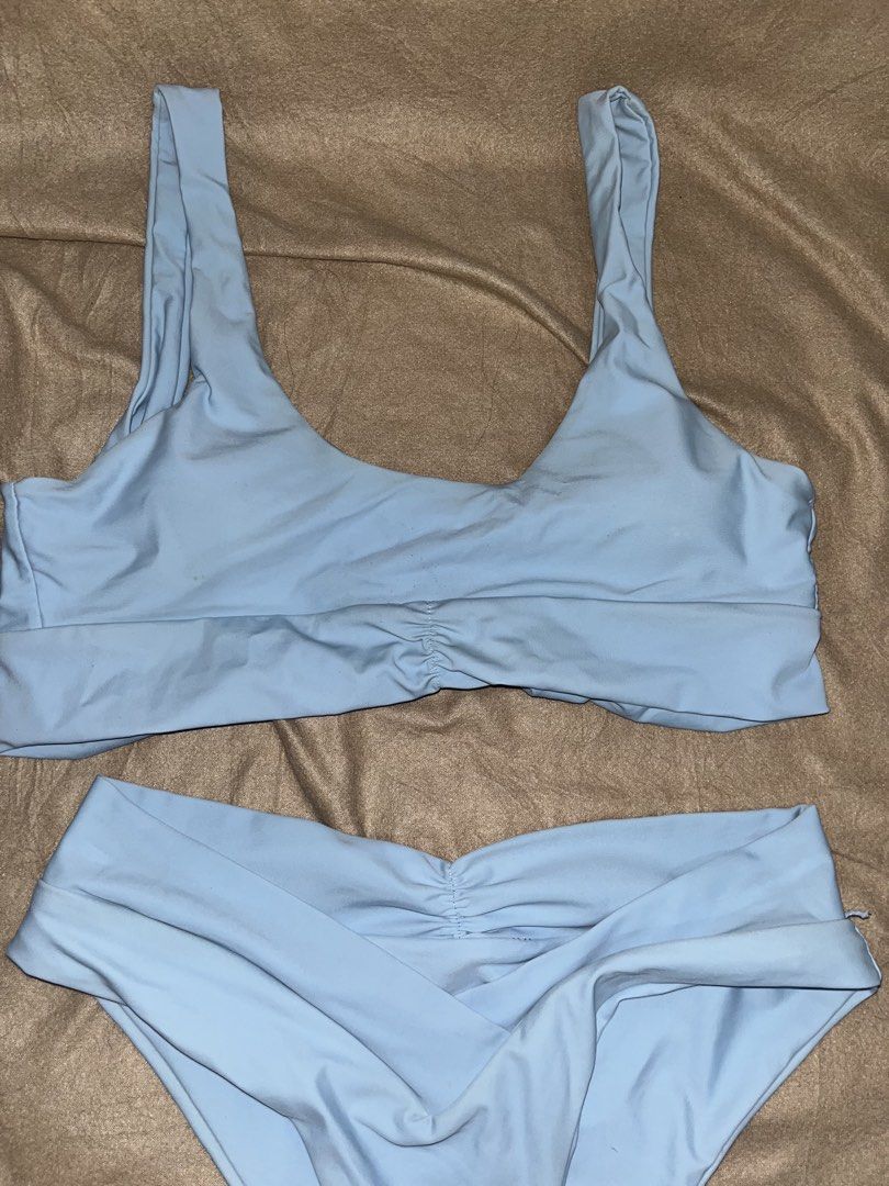 Light Blue Bikini Set (Category: Bikinis & Swimsuits) located in Manila. Submitted by quarishop21 (Listing ID 1432510183, Image 2). Description: - Light blue bikini set (Used Once only) - Scoop neckline top - High-waisted bottoms - Ruched detail on top and bottom - Smooth fabric - Perfect for beach or pool.