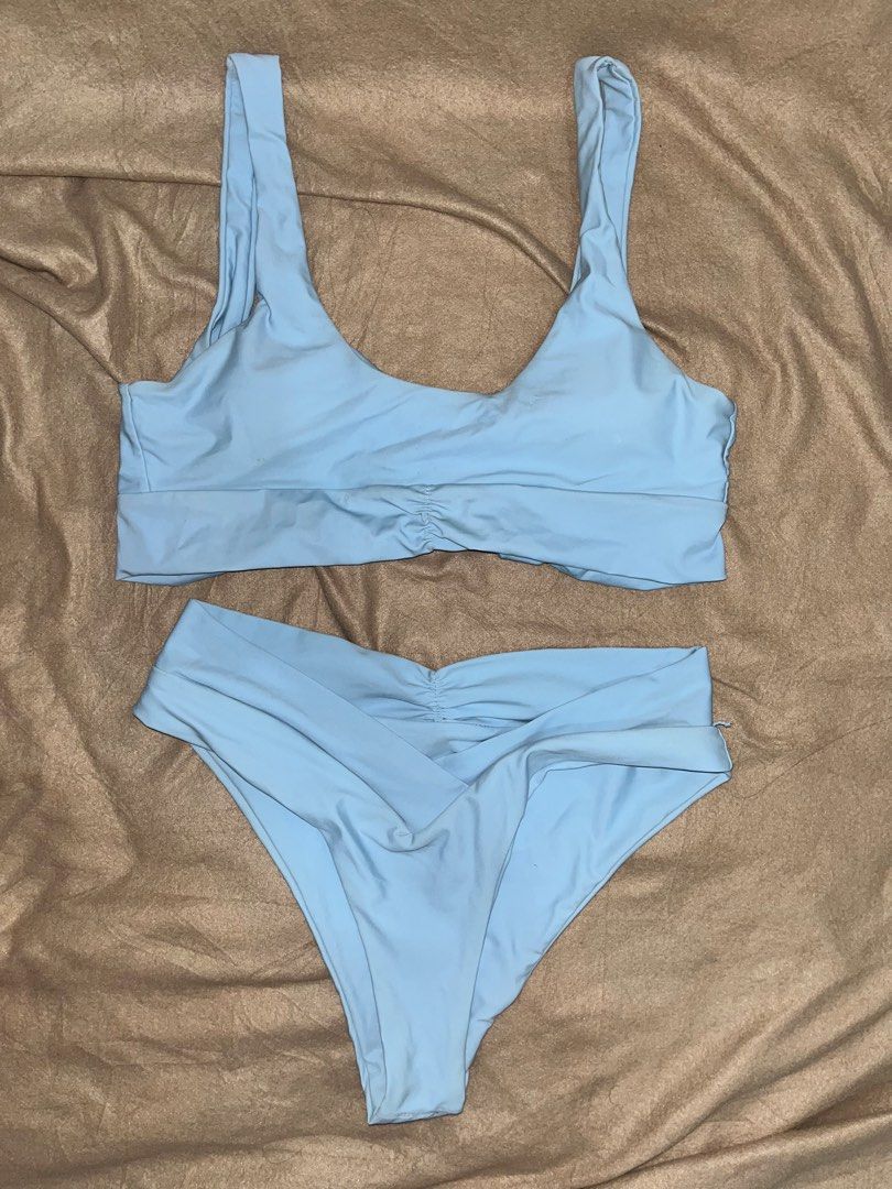 Light Blue Bikini Set (Category: Bikinis & Swimsuits) located in Manila. Submitted by quarishop21 (Listing ID 1432510183, Image 1). Description: - Light blue bikini set (Used Once only) - Scoop neckline top - High-waisted bottoms - Ruched detail on top and bottom - Smooth fabric - Perfect for beach or pool.