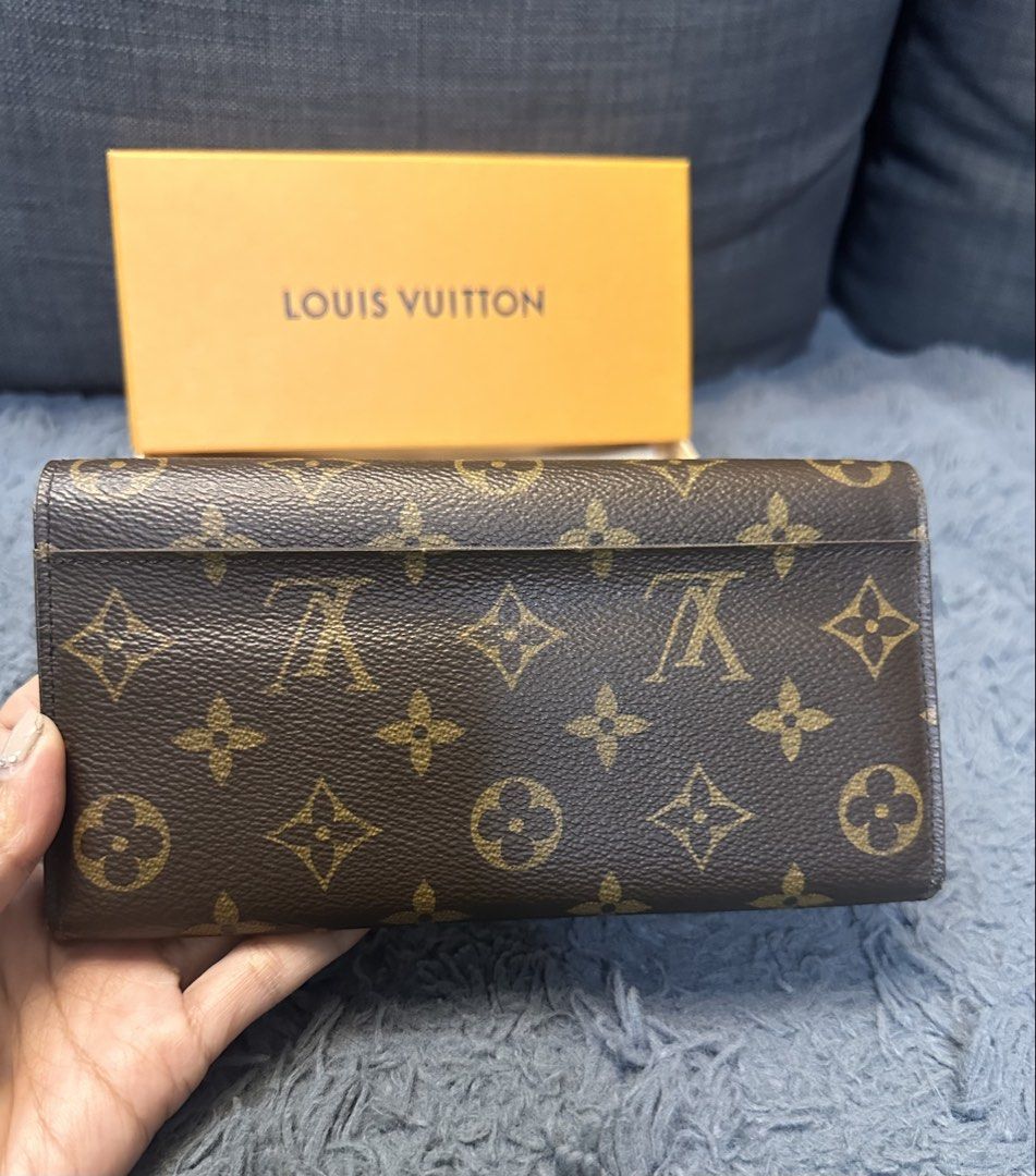 Louis Vuitton Sarah Wallet Monogram (Category: Luxury Bags & Wallets) located in General Trias. Submitted by mimispreloves (Listing ID 1432552641, Image 2). Description: - Authentic Louis Vuitton Sarah Wallet - Monogram canvas - Flap closure with snap button - Pink leather interior - Multiple card slots and compartments - Zippered pocket - Includes original box and dust bag - Perfect for everyday use -Php17k only.