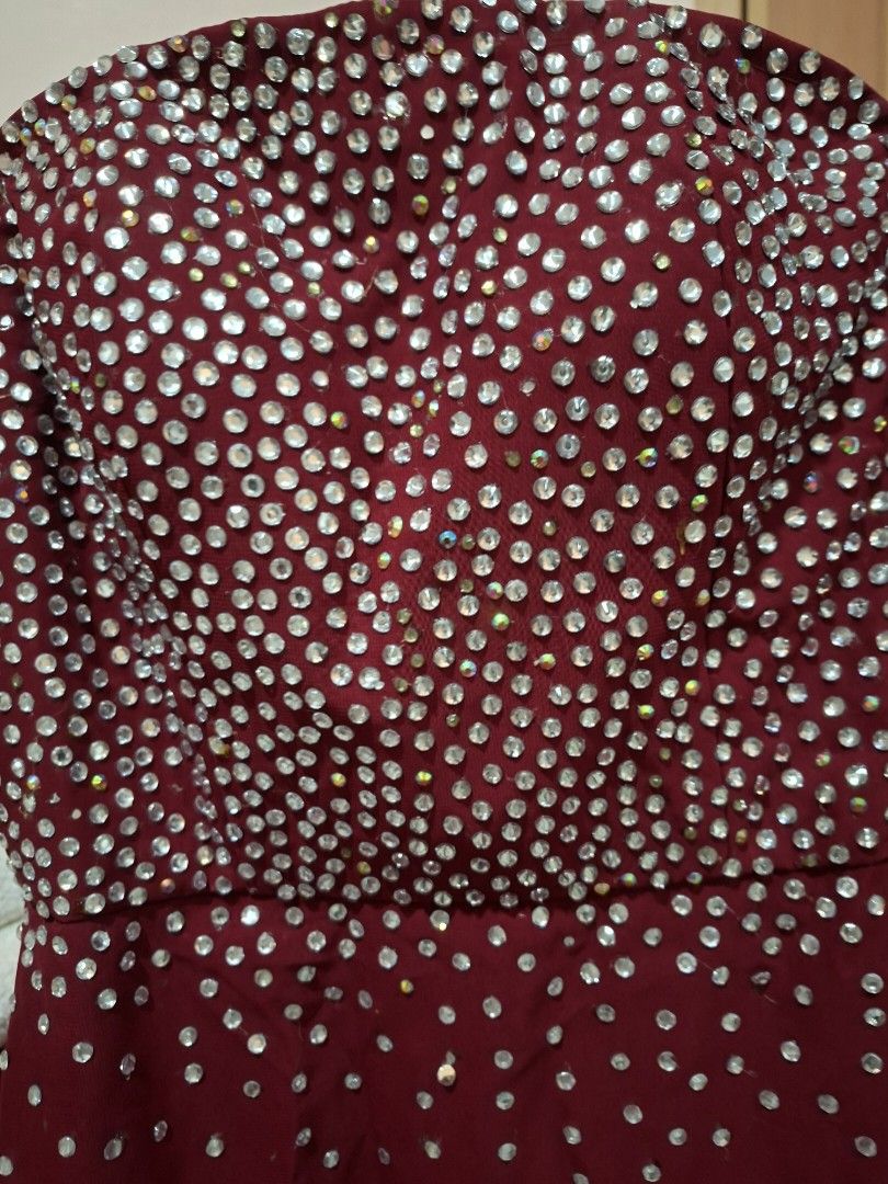 Maroon Embellished Strapless Dress (Category: Dresses) located in Malabon City. Submitted by shaqmax (Listing ID 1432507181, Image 3). Description: - Elegant maroon strapless dress - Heavily embellished bodice with sparkling details - Long, lightweight skirt - Perfect for special occasions Worn only once. Shipping fee is shouldered by the buyer..
