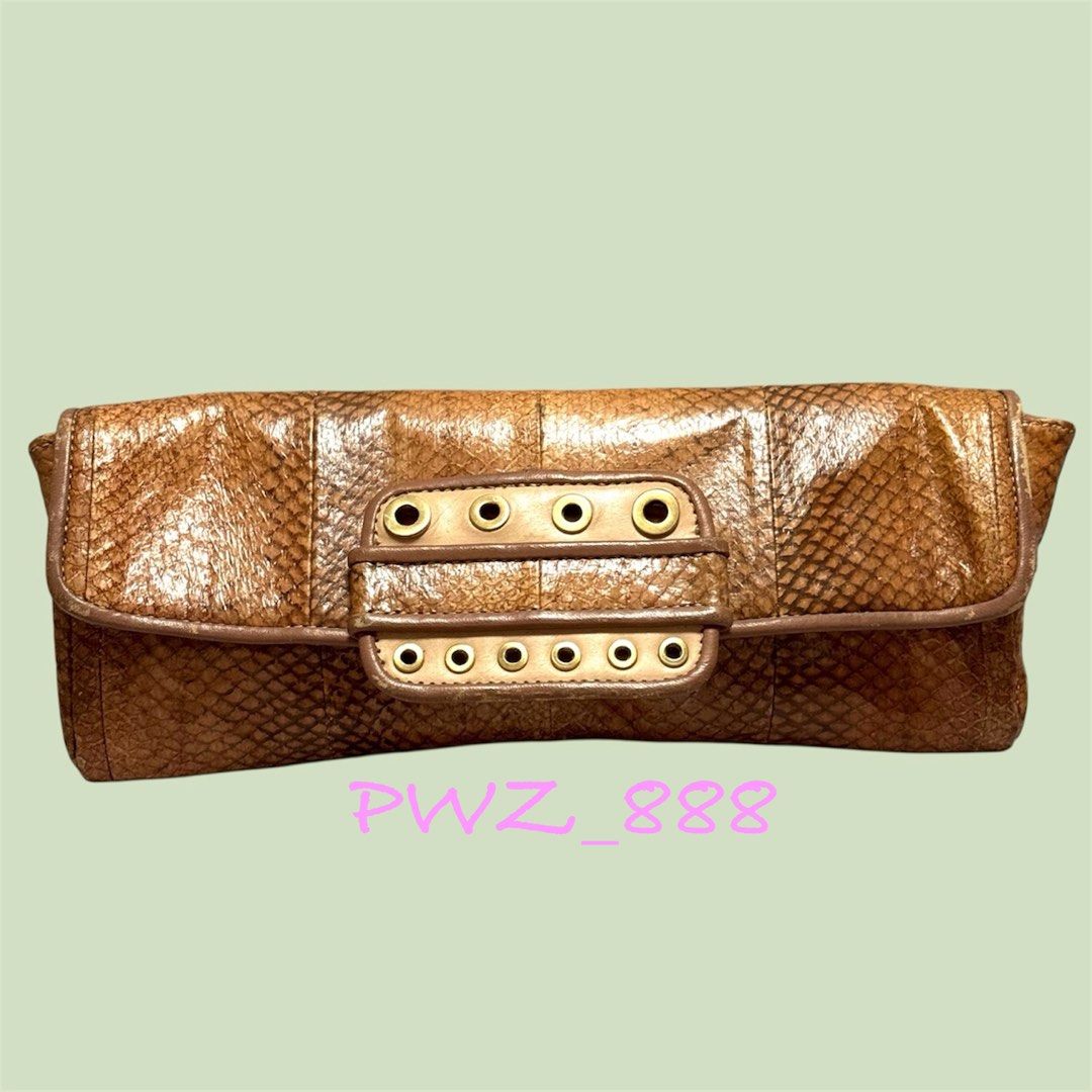 MCM Snakeskin Large Evening Clutch Bag (Category: Luxury Bags & Wallets) located in Baguio. Submitted by pwz-eshop (Listing ID 1432468019, Image 1). Description: • Please take time to read!! • I do not reserve items. I only mark items as reserved when it is paid. Paid items are shipped the next day. No shipping on holidays. • I do not have when worn pictures, please rely on actual dimensions for sizing. • Up for Grabs!! • Flaws: Rubs on leather s