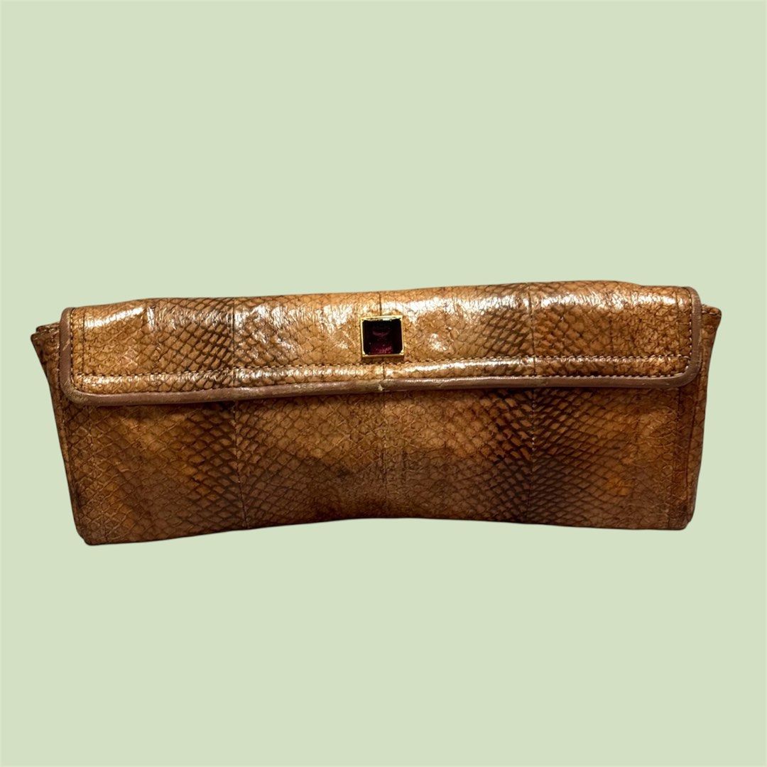 MCM Snakeskin Large Evening Clutch Bag (Category: Luxury Bags & Wallets) located in Baguio. Submitted by pwz-eshop (Listing ID 1432468019, Image 2). Description: • Please take time to read!! • I do not reserve items. I only mark items as reserved when it is paid. Paid items are shipped the next day. No shipping on holidays. • I do not have when worn pictures, please rely on actual dimensions for sizing. • Up for Grabs!! • Flaws: Rubs on leather s