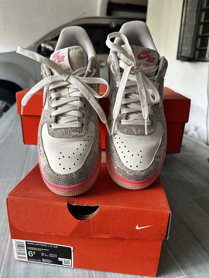 Nike Air Force 1 '07 LV8 Sneakers (Category: Sneakers) located in Cainta. Submitted by ashblake (Listing ID 1432582680, Image 1). Description: - Nike Air Force 1 '07 LV8 - White and snakeskin upper - Pink midsole accents - Size: 6.5 - Soles show wear - Includes original box.
