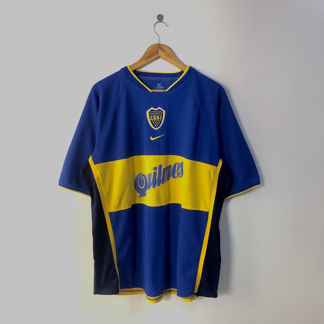 Nike Boca Juniors Home Shirt (Category: Tshirts & Polo Shirts ) located in Makati City. Submitted by guionchris22 (Listing ID 1432415012, Image 1). Description: ▫️[ Nike Boca Juniors 01/02 Home Kit ] •[ Embroidered Team Crest & Nike Logo ] •[ Embossed Quilmes Team Sponsor (Front & Back) ] •[ lints in some areas, kindly note that this is a 25 Year Old Jersey ] •[ Crest is a bit off centered ] ▫️[ Dimensions: 24” x 29” ] ~ ₱8,500 (Negotiable for Su
